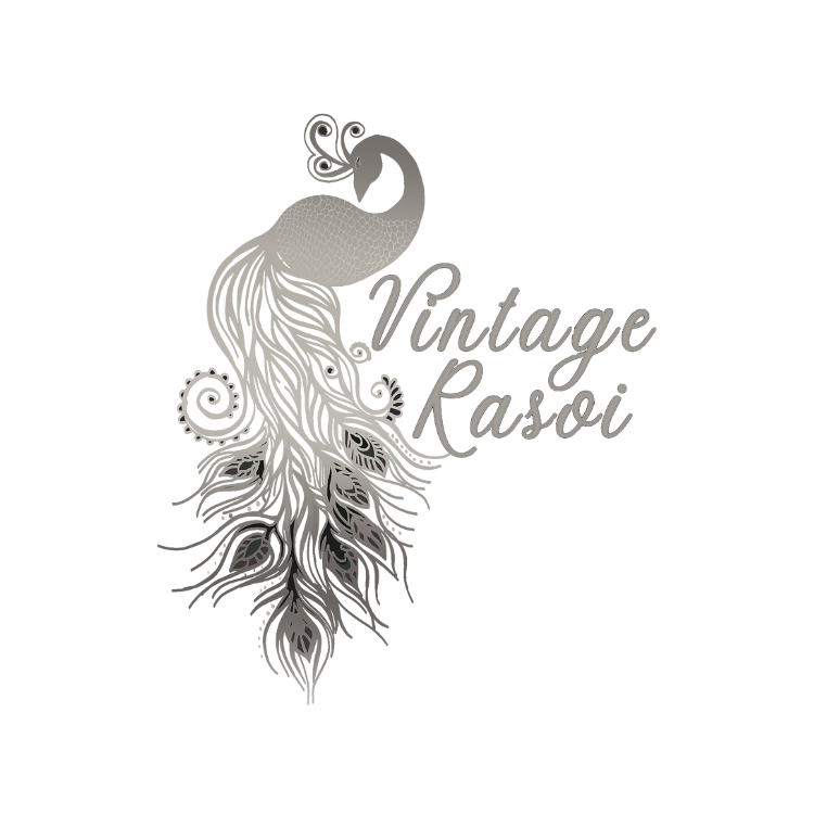 The logo for The Vintage Rasoi features elegant cursive text with a bold, peacock shaped in black and white. The text is set against a white background with a grey border.